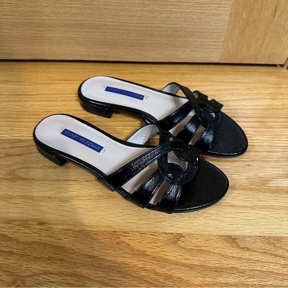 Stuart Weitzman Cami slide sandals in black patent leather
